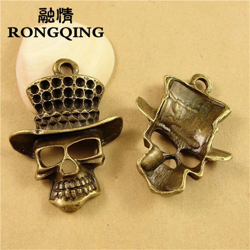 RONGQING 29*39MM Gentleman Skull Pendant Charms 20pcs/lot Hollow Pingente Bronze Charms
RONGQING 29*39MM Gentleman Skull Pendant Charms 20pcs/lot Hollow Pingente Bronze Charms