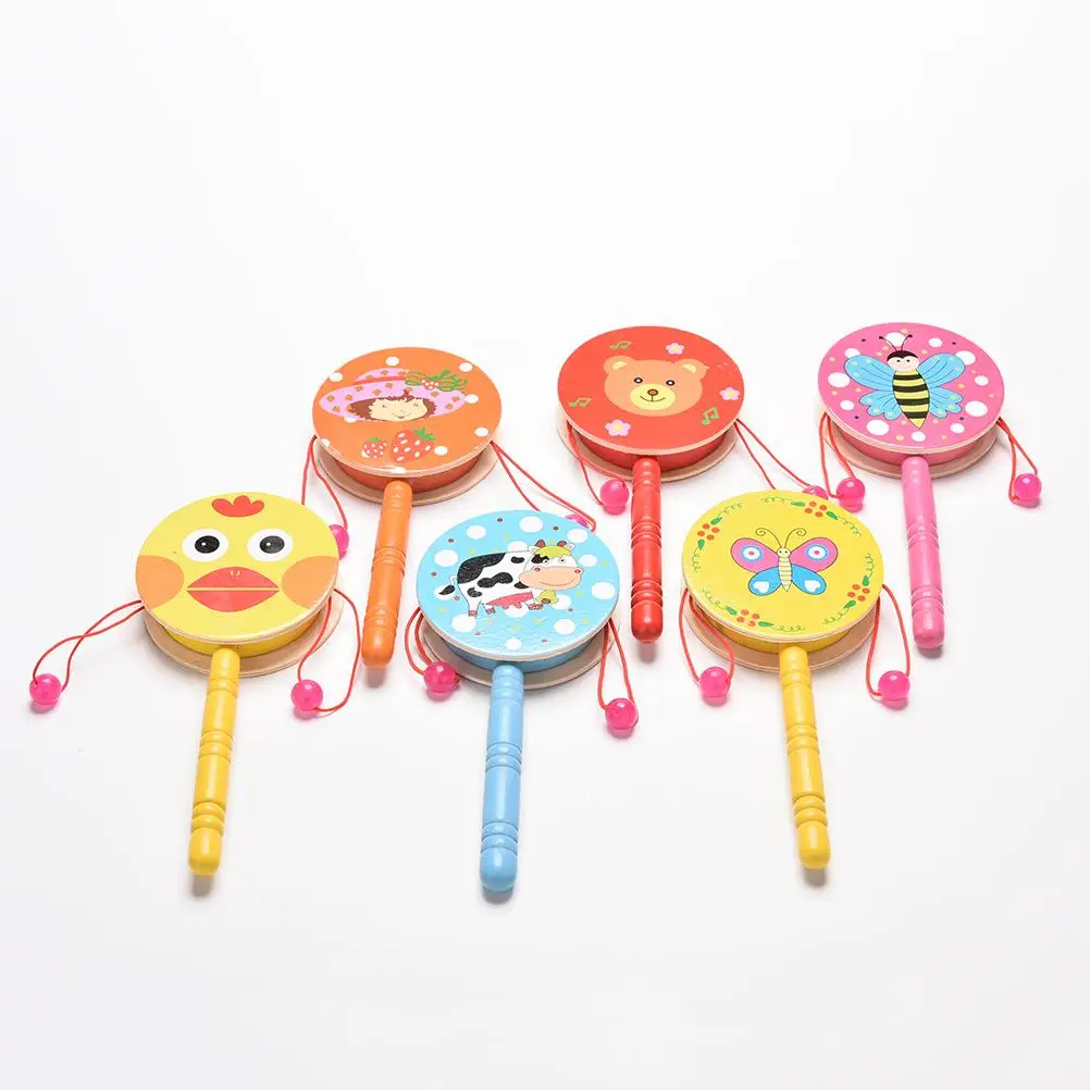 Wooden Funny Rattle Drum Spin Toys Cartoon Handbell Musical Instrument Cute Animal Print Baby Toys
Wooden Funny Rattle Drum Spin Toys Cartoon Handbell Musical Instrument Cute Animal Print Baby Toys