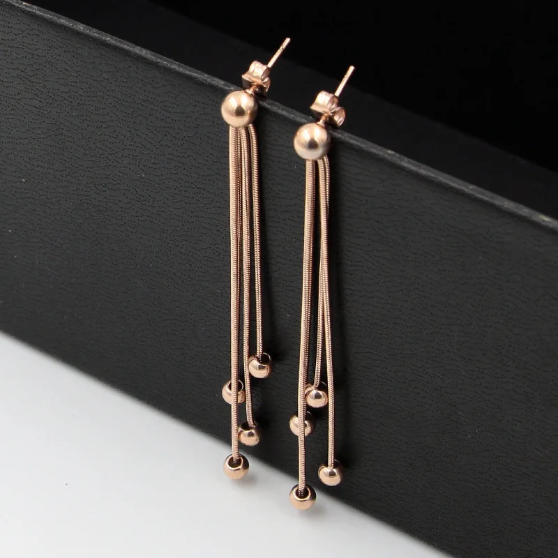 Titanium Steel rose gold color Five steel balls snake chain tassel rose gold ear nail Girl Jewelry Card Coil long Earrings
Titanium Steel rose gold color Five steel balls snake chain tassel rose gold ear nail Girl Jewelry Card Coil long Earrings