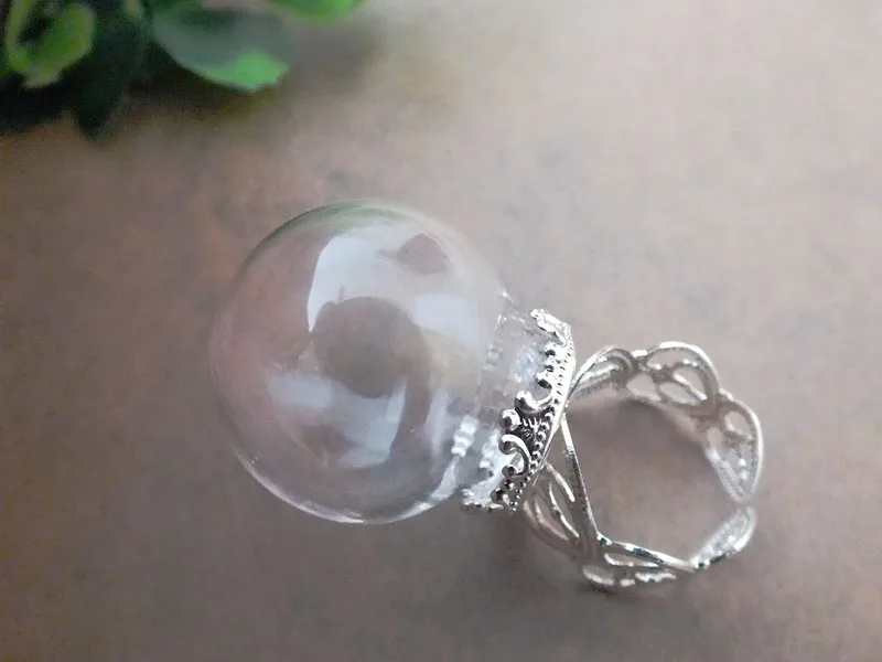 5sets 25x15mm Small glass globe ring with silver plated crown ring base set glass bottle ring DIY handmade ring
5sets 25x15mm Small glass globe ring with silver plated crown ring base set glass bottle ring DIY handmade ring