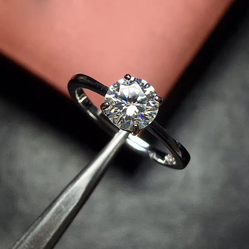 18K White Gold 1Ct 6.5mm Round Cut Moissanites 4 Prong Ring Engagment Solarite Ring For Women
18K White Gold 1Ct 6.5mm Round Cut Moissanites 4 Prong Ring Engagment Solarite Ring For Women