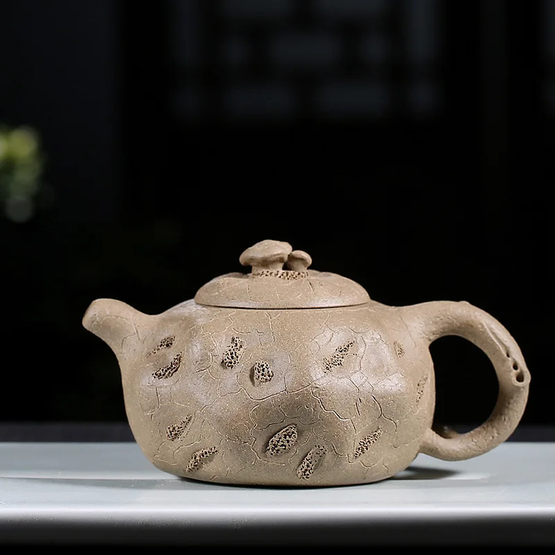 Yixing Purple Sand Pot Hand-Made Mud Ganoderma lucidum for Spring Pot Kungfu Teapot Set Wholesale
Yixing Purple Sand Pot Hand-Made Mud Ganoderma lucidum for Spring Pot Kungfu Teapot Set Wholesale