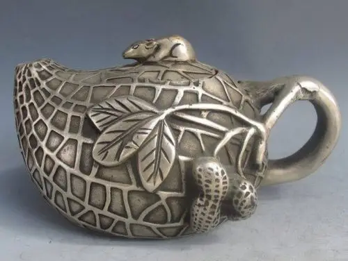 Interesting Old Antique Tibetan Silver Peanut-Shape Teapot & Mouse Lid with Qianlong Mark
Interesting Old Antique Tibetan Silver Peanut-Shape Teapot & Mouse Lid with Qianlong Mark