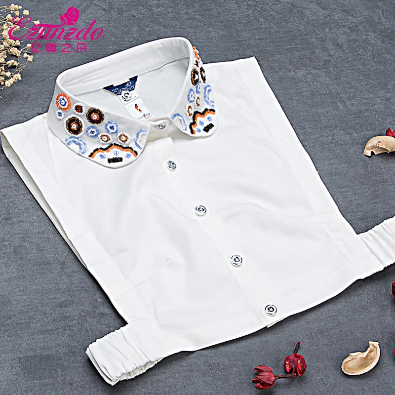 Female autumn and winter all-match shirt collar rhinestone beading fashion shirt winter sweater decoration
Female autumn and winter all-match shirt collar rhinestone beading fashion shirt winter sweater decoration