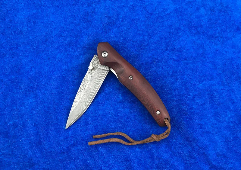 LEMIFSHE VG10 Damascus steel folding knife blade, sandalwood + stainless steel processing folding camping fruit knife EDC tool
LEMIFSHE VG10 Damascus steel folding knife blade, sandalwood + stainless steel processing folding camping fruit knife EDC tool