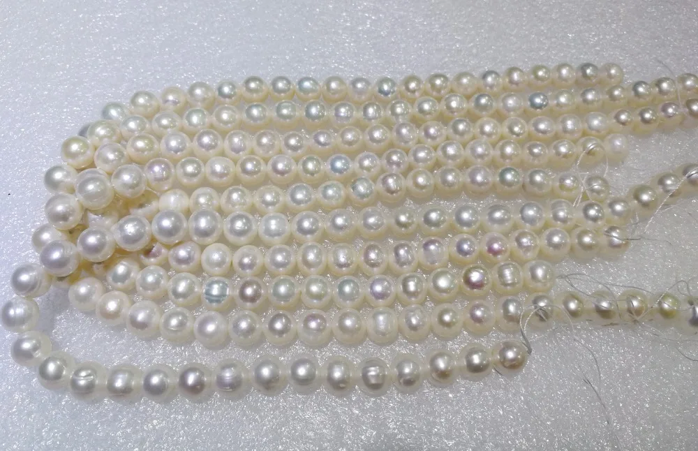 

One Strands 10-11mm bright white pearl real natural freshwater pearl loose beads 35cm / 14.5inch DIY