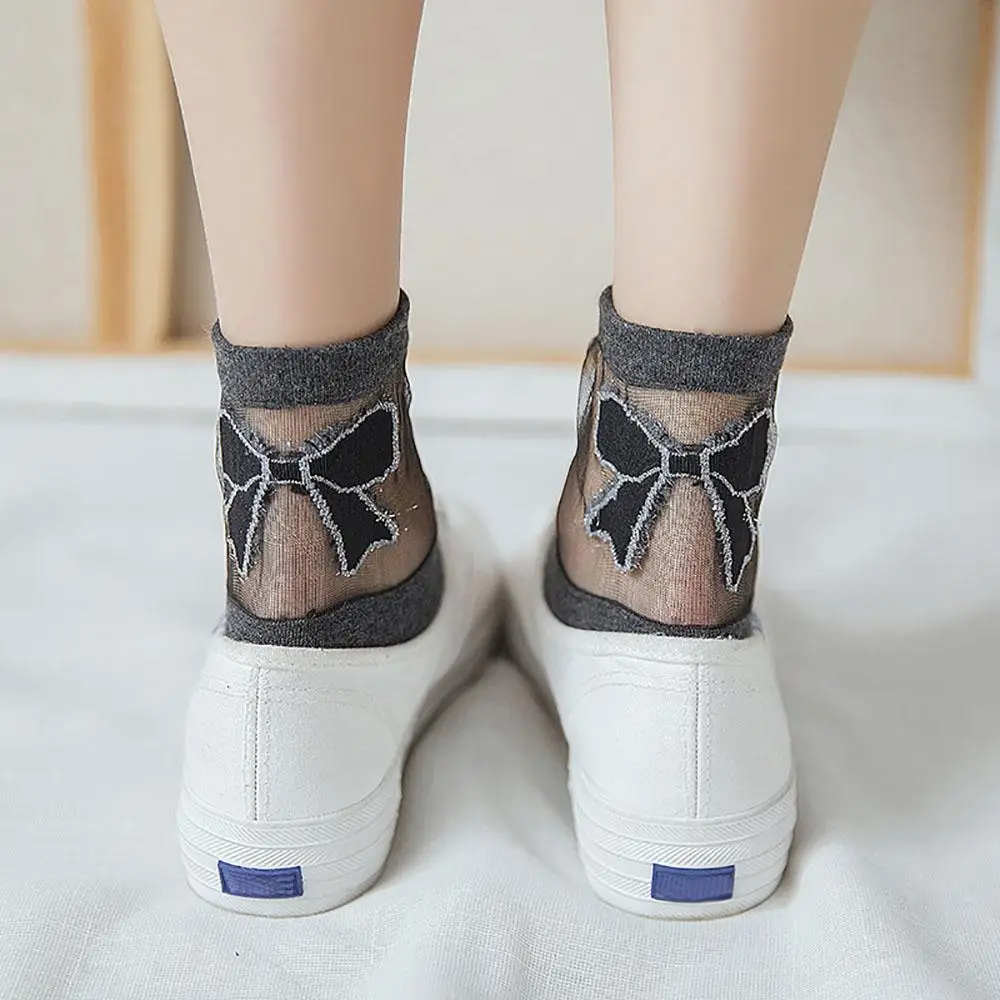 Женские ультратонкие кружевные носки Calcetines De Mujer Meias, летние прозрачные носки с бантом
Женские ультратонкие кружевные носки Calcetines De Mujer Meias, летние прозрачные носки с бантом