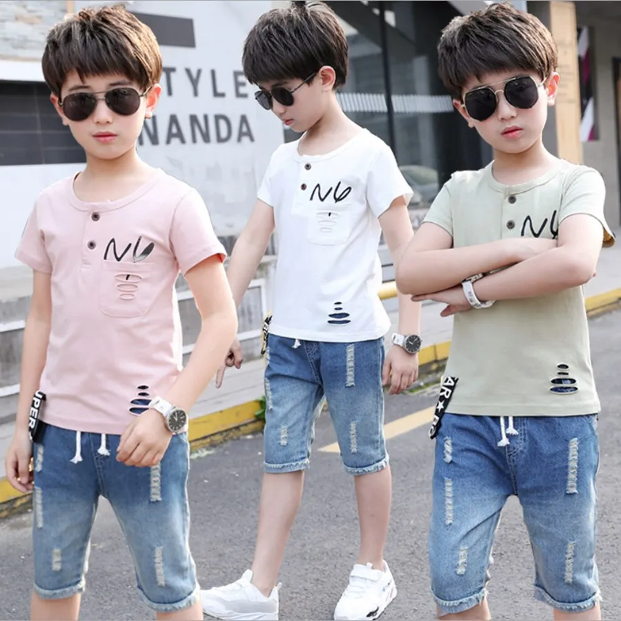 22 Colors 4-14 Years Boy Clothes Sport Suit 2021 Summer Fashion Casual Short Sleeve T-Shirt + Jeans Children Clothing Set
22 Colors 4-14 Years Boy Clothes Sport Suit 2021 Summer Fashion Casual Short Sleeve T-Shirt + Jeans Children Clothing Set
