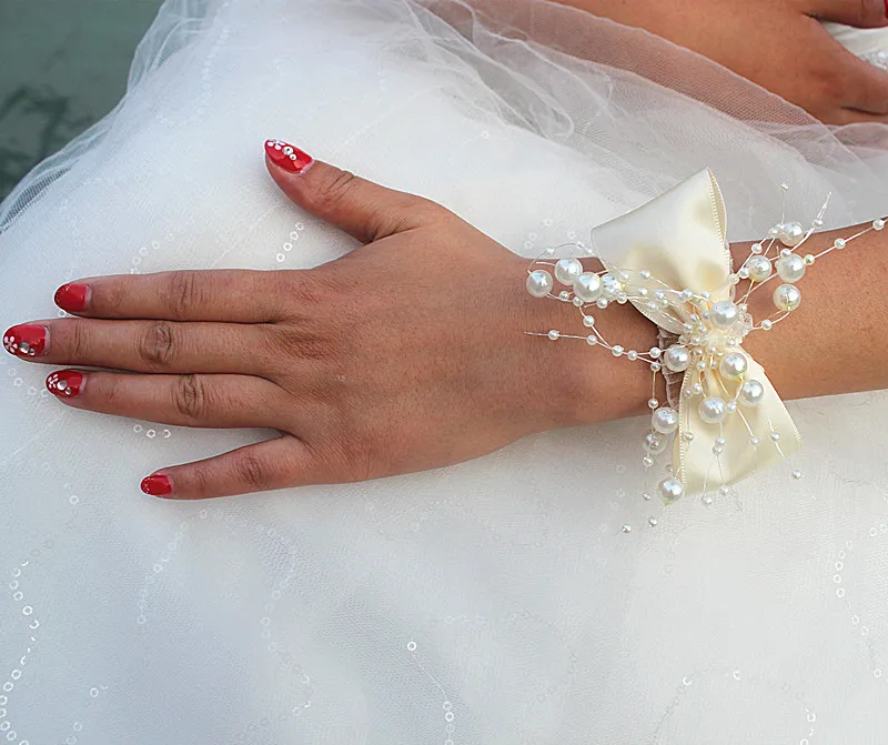 Marfim Ivory Bow Tie Pearl Beaded Wedding Wrist Flowers Bridesmaid de Marriage Silk Ribbon Corsages Wrist Flowers SW017
Marfim Ivory Bow Tie Pearl Beaded Wedding Wrist Flowers Bridesmaid de Marriage Silk Ribbon Corsages Wrist Flowers SW017