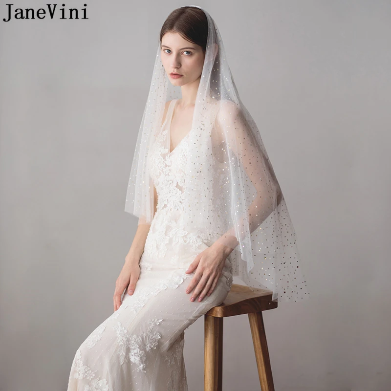 JaneVini 2019 Shiny Ivory Bridal Veils Stars Sequined Veil Two Layer Elbow Length Veil with Comb Tulle Short Wedding Accessories
JaneVini 2019 Shiny Ivory Bridal Veils Stars Sequined Veil Two Layer Elbow Length Veil with Comb Tulle Short Wedding Accessories