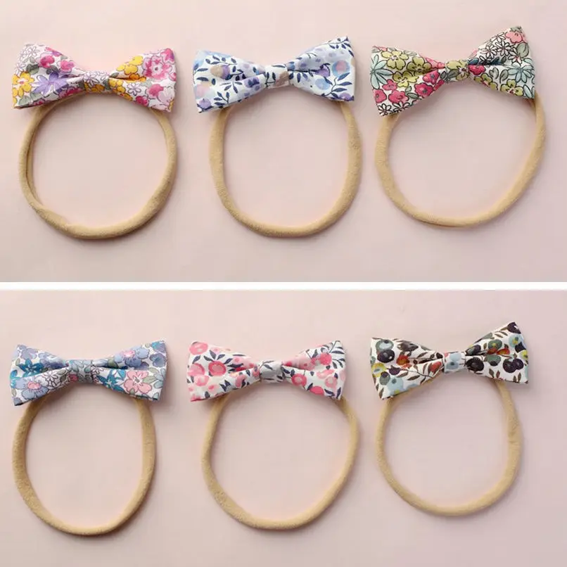 Pink Watercolor Floral Fabric Felt Bow Nylon One Size Headband Newborn Shower gift Baby Toddler Girls Mini hair bows HB338S
Pink Watercolor Floral Fabric Felt Bow Nylon One Size Headband Newborn Shower gift Baby Toddler Girls Mini hair bows HB338S