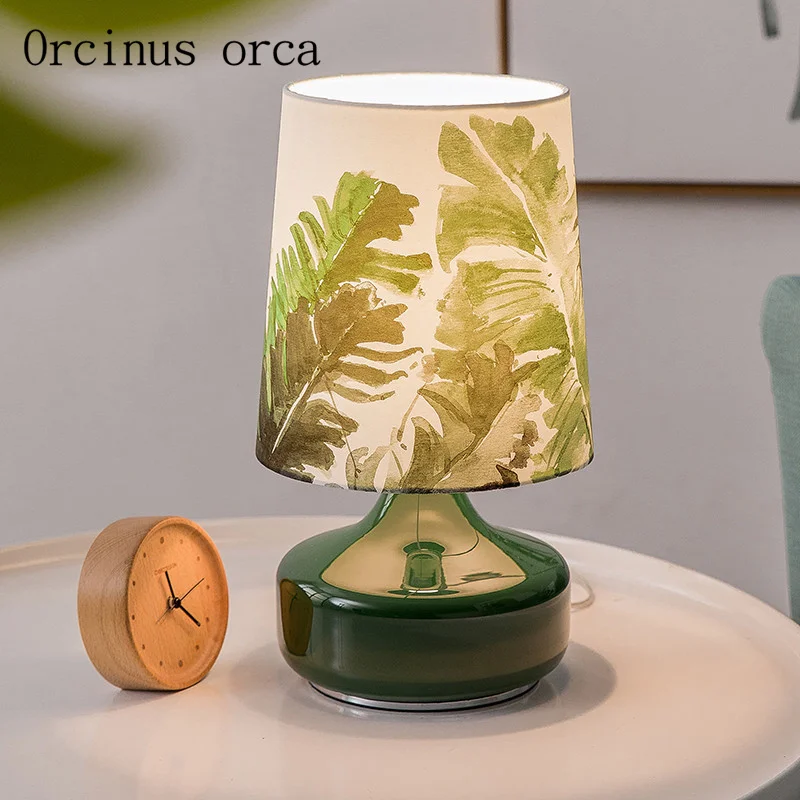 Nordic modern simple green ceramic table lamp living room bedside lamp pastoral creative art girl decoration small table lamp
Nordic modern simple green ceramic table lamp living room bedside lamp pastoral creative art girl decoration small table lamp