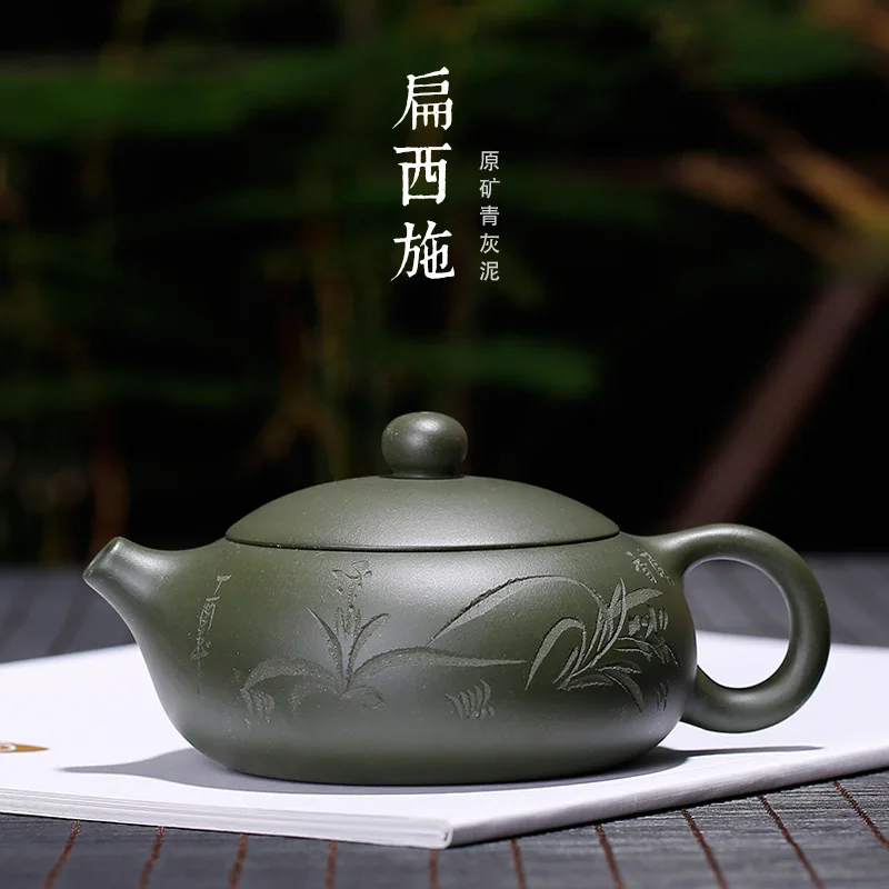 Yixing Purple Sand Huyuan Mine Green Mud Bian Xishi Hand-carved Small and Medium Pot Carved Orchids
Yixing Purple Sand Huyuan Mine Green Mud Bian Xishi Hand-carved Small and Medium Pot Carved Orchids