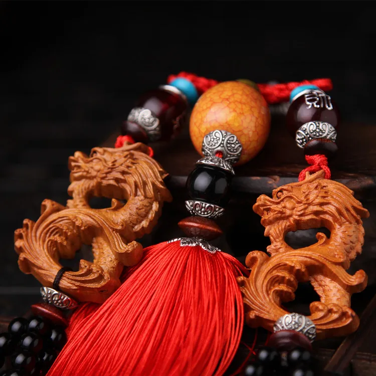 Boutique hot car pendant eight character dragon high-grade peach wood key chain car pendulum ornaments carved car hanging car
Boutique hot car pendant eight character dragon high-grade peach wood key chain car pendulum ornaments carved car hanging car