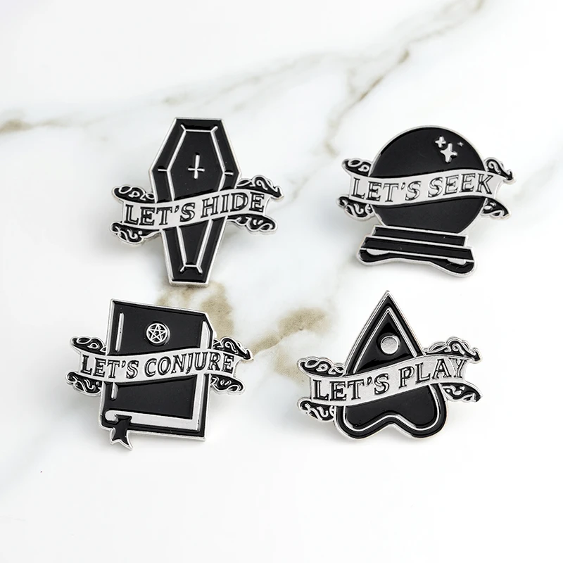 4pcs/set Tiny Black Pin Let's conjure, seek, hide, and play Enamel pins Heart Coffin Magic spell Pins Brooches Badges Lapel pin
4pcs/set Tiny Black Pin Let's conjure, seek, hide, and play Enamel pins Heart Coffin Magic spell Pins Brooches Badges Lapel pin