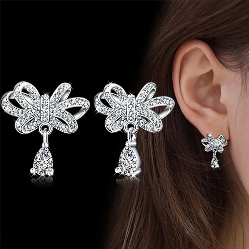KOFSAC Top Quality Shiny Crystal CZ Bow-Knot Earring Fashion 925 Sterling Silver Stud Earrings For Women Party Ear Jewelry Gift
KOFSAC Top Quality Shiny Crystal CZ Bow-Knot Earring Fashion 925 Sterling Silver Stud Earrings For Women Party Ear Jewelry Gift