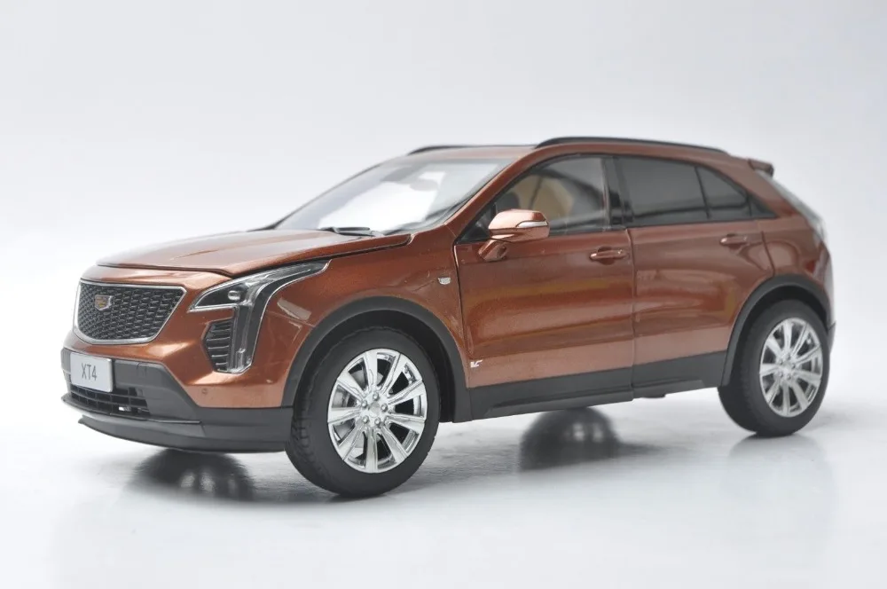 Модель литая в масштабе 1:18 для внедорожника GM Cadillac XT4 Orange SUV 2018, игрушечная машинка из сплава, миниатюрные коллекционные подарки XT
Модель литая в масштабе 1:18 для внедорожника GM Cadillac XT4 Orange SUV 2018, игрушечная машинка из сплава, миниатюрные коллекционные подарки XT