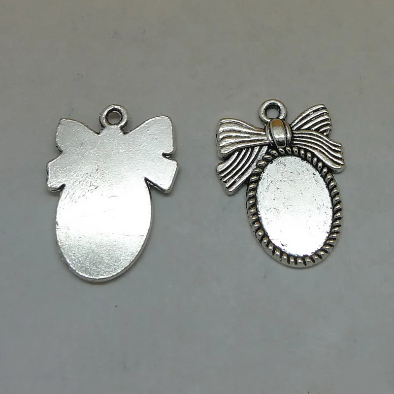 Free shipping Bow oval 8pcs inner size 14x10mm outer size 18x24mm Vintage Antique Silver Color Cameo Cabochon Base Setting
Free shipping Bow oval 8pcs inner size 14x10mm outer size 18x24mm Vintage Antique Silver Color Cameo Cabochon Base Setting