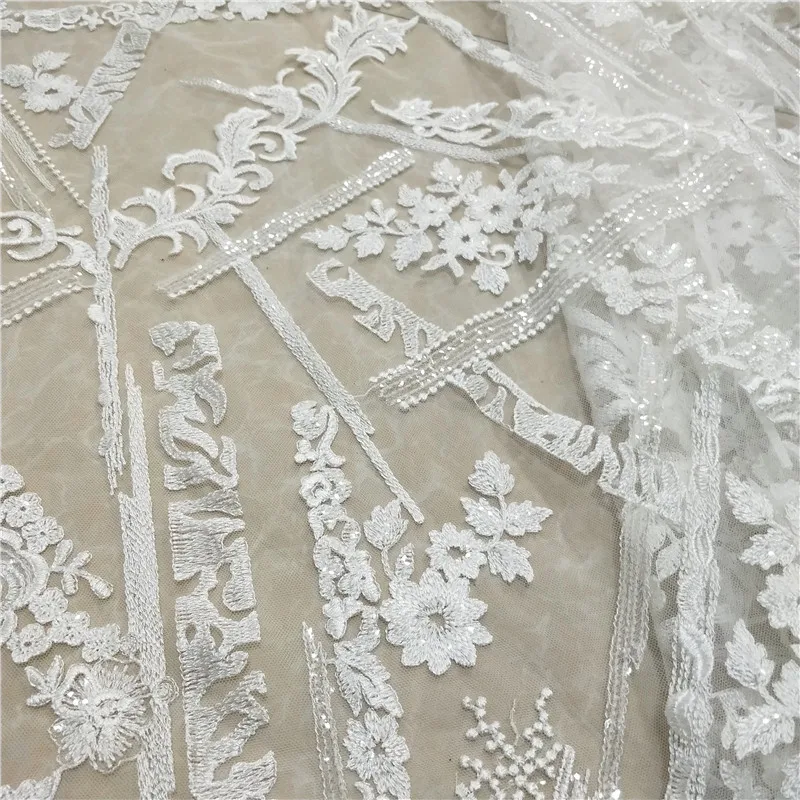 1 Yard Shiny sequined lace Rayon embroidered Ivory wedding lace with sequins! 2019 NEW design nice 
1 Yard Shiny sequined lace Rayon embroidered Ivory wedding lace with sequins! 2019 NEW design nice