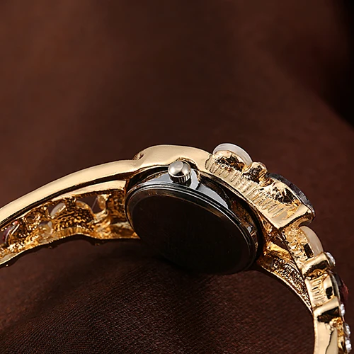 Women Lady Beauty Crystal Colored Alloy Flower Bangle Bracelet Gold Watch Analog Quartz Gemstone Classic Dress Wristwatch Fashio
Women Lady Beauty Crystal Colored Alloy Flower Bangle Bracelet Gold Watch Analog Quartz Gemstone Classic Dress Wristwatch Fashio