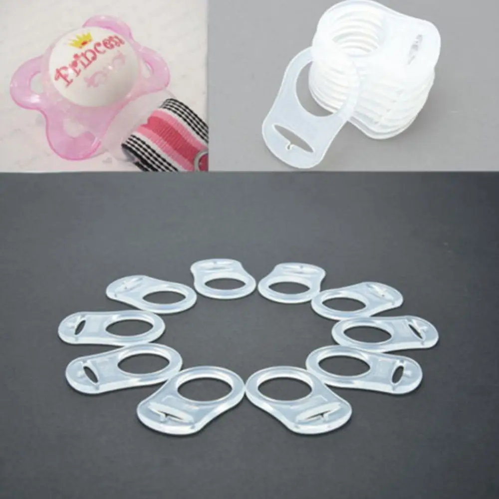 Baby Boy Girl 10 pcs/Lot Clear Silicone Button MAM Ring Dummy / Pacifier Holder Rings Baby Pacifier Ribbon Clips Clip Adapter
Baby Boy Girl 10 pcs/Lot Clear Silicone Button MAM Ring Dummy / Pacifier Holder Rings Baby Pacifier Ribbon Clips Clip Adapter