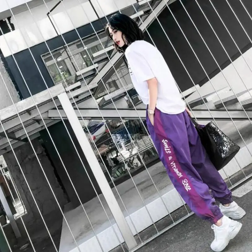 Hip hop loose beam wide leg pants female 2018 summer new Korean version of the letter print ankle-length pants L951 wholesale
Hip hop loose beam wide leg pants female 2018 summer new Korean version of the letter print ankle-length pants L951 wholesale