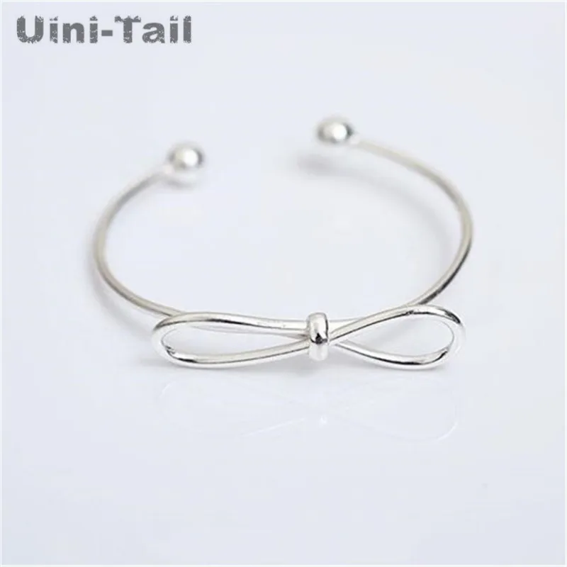 Uini-Tail, хит продаж, новая Корейская версия стерлингового серебра 925 пробы, Открытый браслет с бантом, женская простая мода, дикие ювелирные из...
Uini-Tail, хит продаж, новая Корейская версия стерлингового серебра 925 пробы, Открытый браслет с бантом, женская простая мода, дикие ювелирные из...