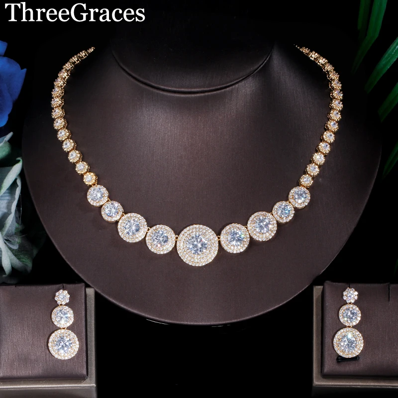 ThreeGraces Famous Luxury AAA Round CZ Cluster Stone Dubai Gold Necklace and Earrings Jewelry Set for Bridal Wedding Party JS051
ThreeGraces Famous Luxury AAA Round CZ Cluster Stone Dubai Gold Necklace and Earrings Jewelry Set for Bridal Wedding Party JS051