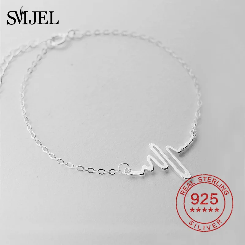 Браслет-цепочка SMJEL Love Heart Beat из 100% стерлингового серебра 925 пробы с сердечным ритмом, ювелирные изделия для женщин
Браслет-цепочка SMJEL Love Heart Beat из 100% стерлингового серебра 925 пробы с сердечным ритмом, ювелирные изделия для женщин