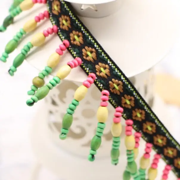10Yard Bohemian Ethnic Retro Jacquard Lace Ribbon Beaded Lace Fringe Trims Hanging Wooden Beads DIY Clothing Collars Accessories
10Yard Bohemian Ethnic Retro Jacquard Lace Ribbon Beaded Lace Fringe Trims Hanging Wooden Beads DIY Clothing Collars Accessories