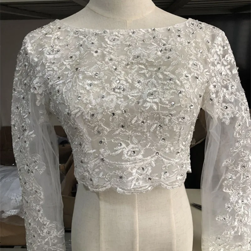 New Real Image Luxury Crystals New Wedding Jacket Bridal Lace Applique Bolero Long Sleeve Shrug White Ivory Wraps Custom Jacket
New Real Image Luxury Crystals New Wedding Jacket Bridal Lace Applique Bolero Long Sleeve Shrug White Ivory Wraps Custom Jacket