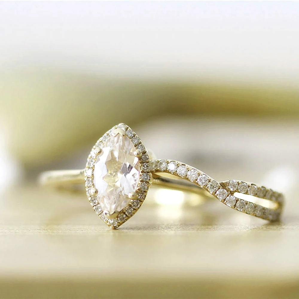 14K желтое золото Marquise Moissanite набор обручальных колец 1.4CTW 5х10 мм для женщин в ювелирных изделиях
14K желтое золото Marquise Moissanite набор обручальных колец 1.4CTW 5х10 мм для женщин в ювелирных изделиях