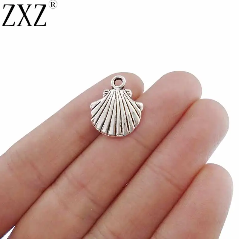 ZXZ 20 шт. ракушки фестоны пляжные морские фотоаксессуары для изготовления ювелирных изделий 18x15 мм
ZXZ 20 шт. ракушки фестоны пляжные морские фотоаксессуары для изготовления ювелирных изделий 18x15 мм