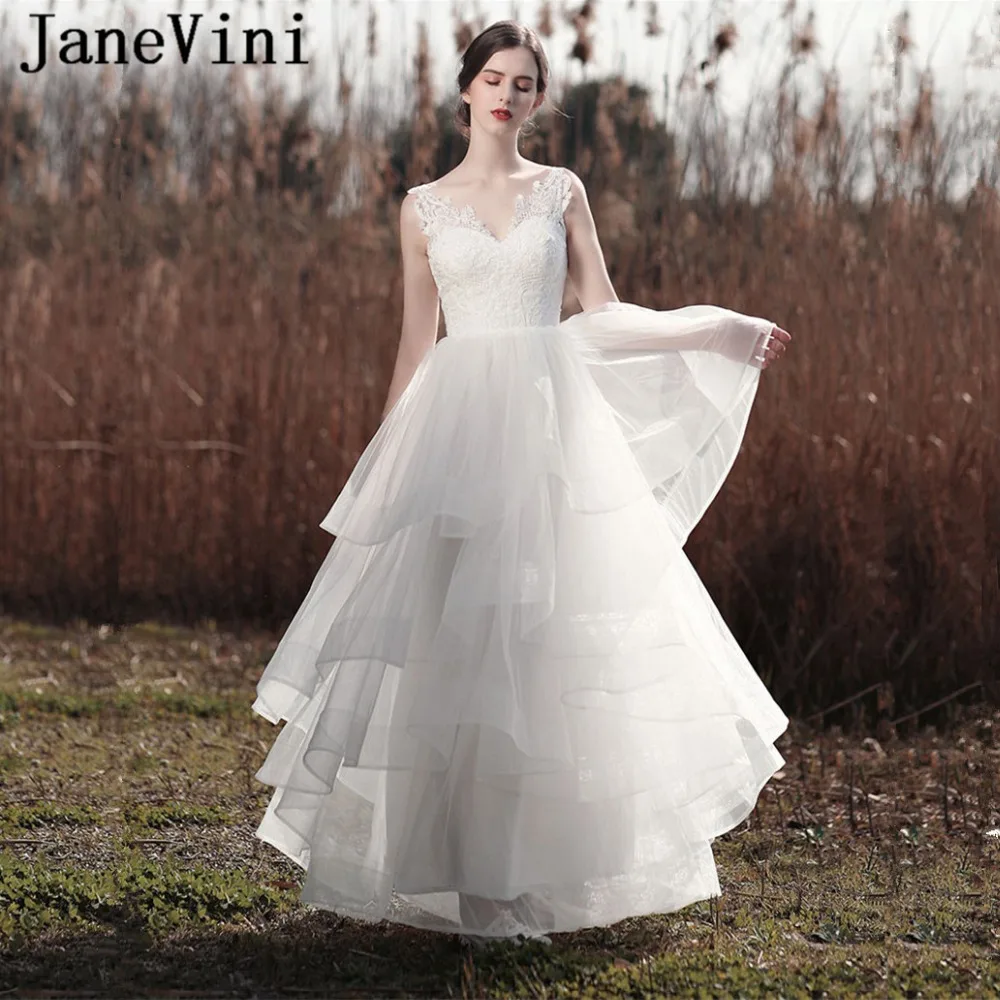 JaneVini Elegant White Long Wedding Dresses V Neck Appliques Sequined Princess A Line Tiered Tulle Bridal Gowns Vestido De Noiva
JaneVini Elegant White Long Wedding Dresses V Neck Appliques Sequined Princess A Line Tiered Tulle Bridal Gowns Vestido De Noiva
