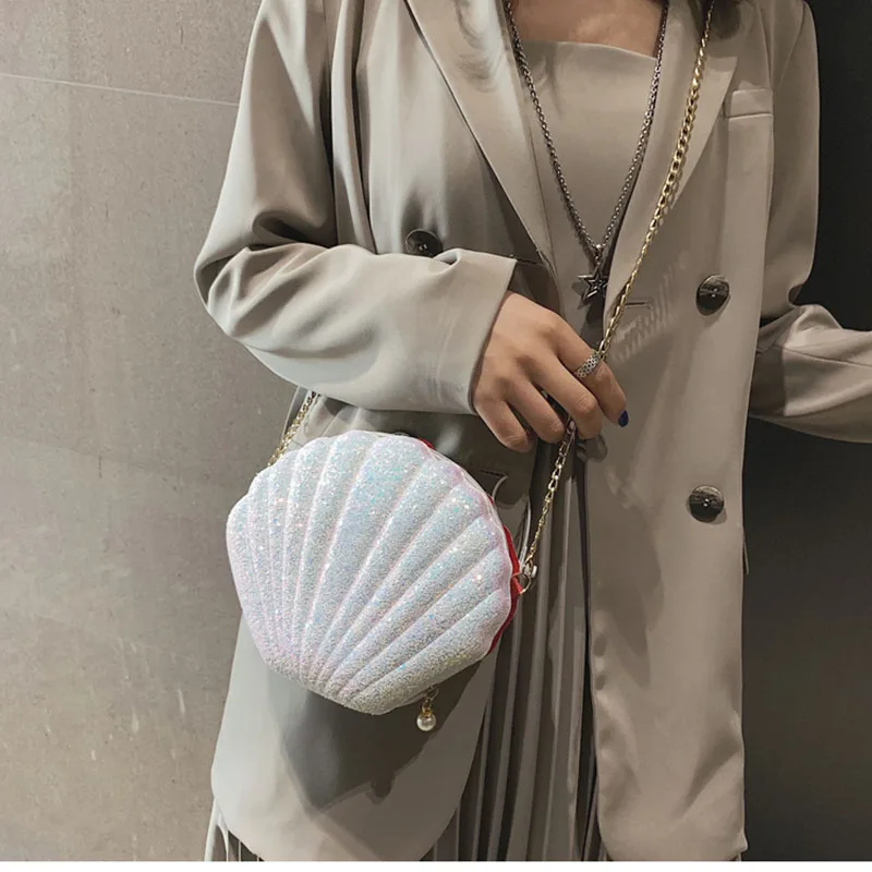 Baggage Lady In Summer 2019 New Beach Shell Wrap Inclined Straddle Bag Lovely Sequin Chain Single Shoulder Bag WWJ264
Baggage Lady In Summer 2019 New Beach Shell Wrap Inclined Straddle Bag Lovely Sequin Chain Single Shoulder Bag WWJ264