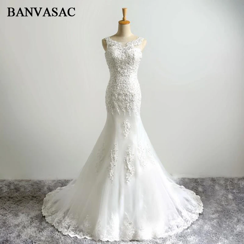 BANVASAC 2017 Новое Элегантное свадебное платье с вышивкой и круглым вырезом без рукавов атласное платье с бисером кружевное свадебное платье со ...
BANVASAC 2017 Новое Элегантное свадебное платье с вышивкой и круглым вырезом без рукавов атласное платье с бисером кружевное свадебное платье со ...