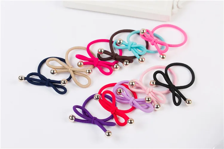 New arrival 10pcs Women fashion candy color ruuber bow beads hair bands gum girl's lovely Hair accessories rope headwear
New arrival 10pcs Women fashion candy color ruuber bow beads hair bands gum girl's lovely Hair accessories rope headwear