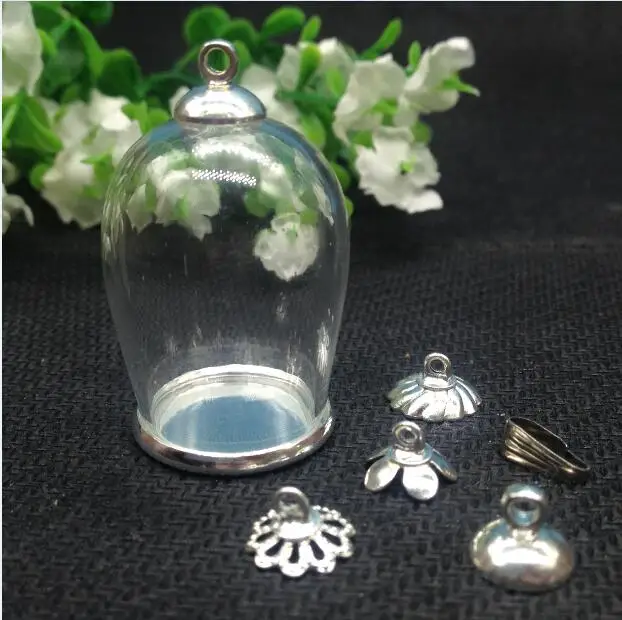 100sets 30x18mm Cloche oval shaped arch wishing bottle jar silver color flat bottomed tray Christmas vial pendant glass globes
100sets 30x18mm Cloche oval shaped arch wishing bottle jar silver color flat bottomed tray Christmas vial pendant glass globes