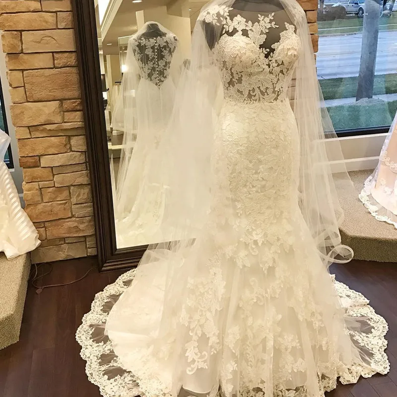 Vestido De Noiva Sleeveless Princess Mermaid Wedding Dresses 2018 Illusion Appliques Beaded Lace A Line Bridal Gown Plus Size
Vestido De Noiva Sleeveless Princess Mermaid Wedding Dresses 2018 Illusion Appliques Beaded Lace A Line Bridal Gown Plus Size