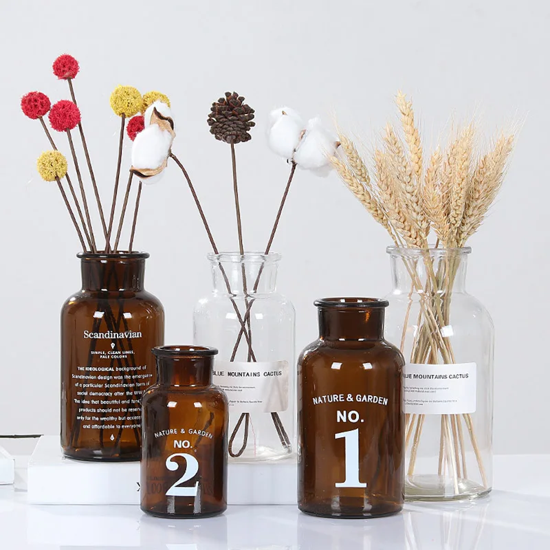 DIY Flowers Vase Home Creative Jewelry Ornaments Transparent Dried Flower Hydroponic Small Brown Bottle Vase Bedside Decoration
DIY Flowers Vase Home Creative Jewelry Ornaments Transparent Dried Flower Hydroponic Small Brown Bottle Vase Bedside Decoration