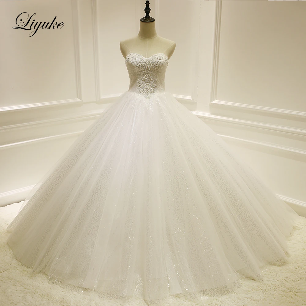Liyuke Strapless Sweetheart Neckline A Line Wedding Dress Glitter Tulle Floor Length Without Train
Liyuke Strapless Sweetheart Neckline A Line Wedding Dress Glitter Tulle Floor Length Without Train