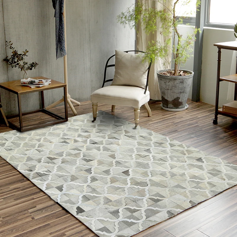 Modern Nordic natural cow skin mat living room dining room patchwork rug and floor carpet.
Modern Nordic natural cow skin mat living room dining room patchwork rug and floor carpet.