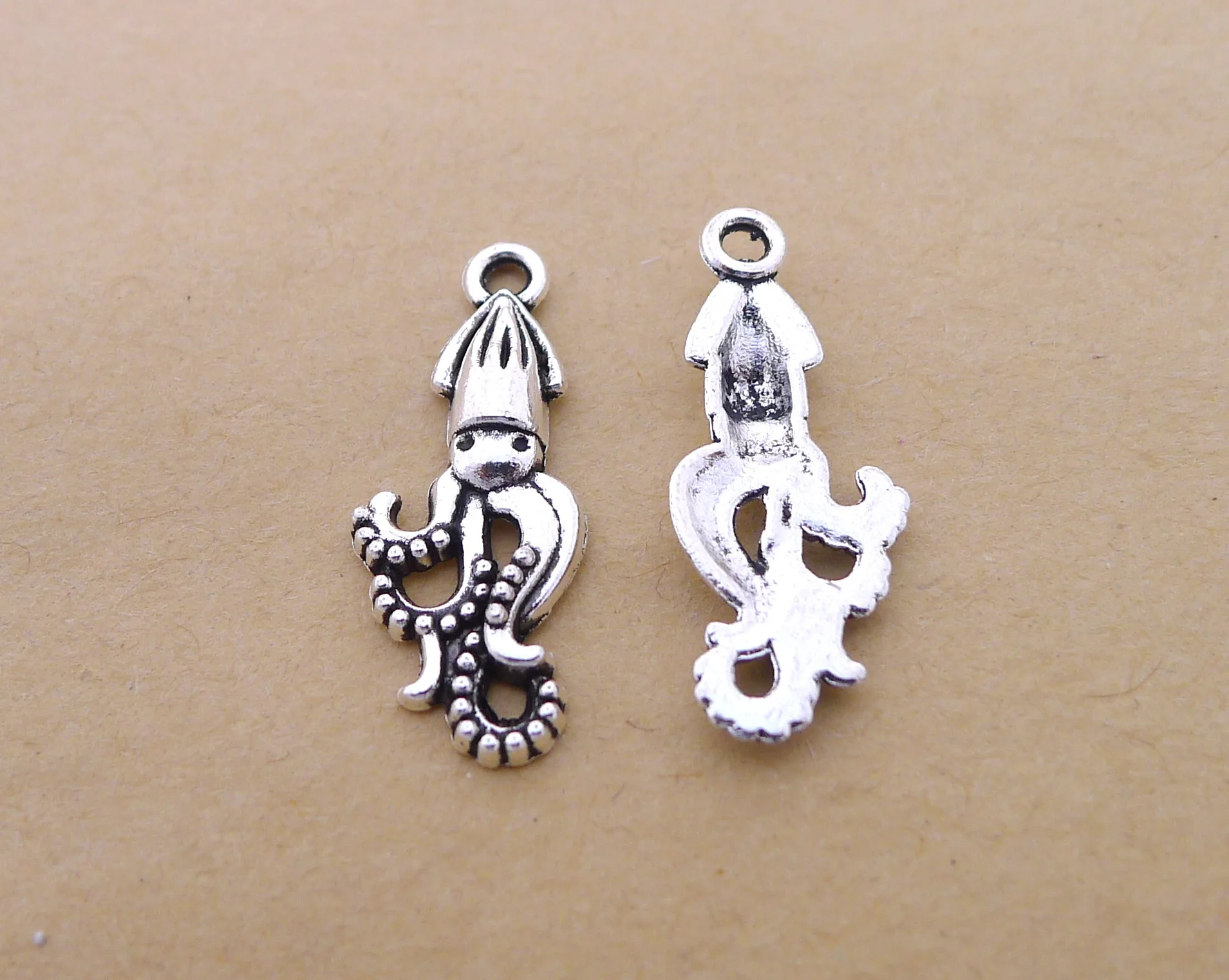 200pcs Exquisite Squid charms 10x25mm pendants Antique silver bag Handmade earring bracelet necklace anklet Component DIY
200pcs Exquisite Squid charms 10x25mm pendants Antique silver bag Handmade earring bracelet necklace anklet Component DIY