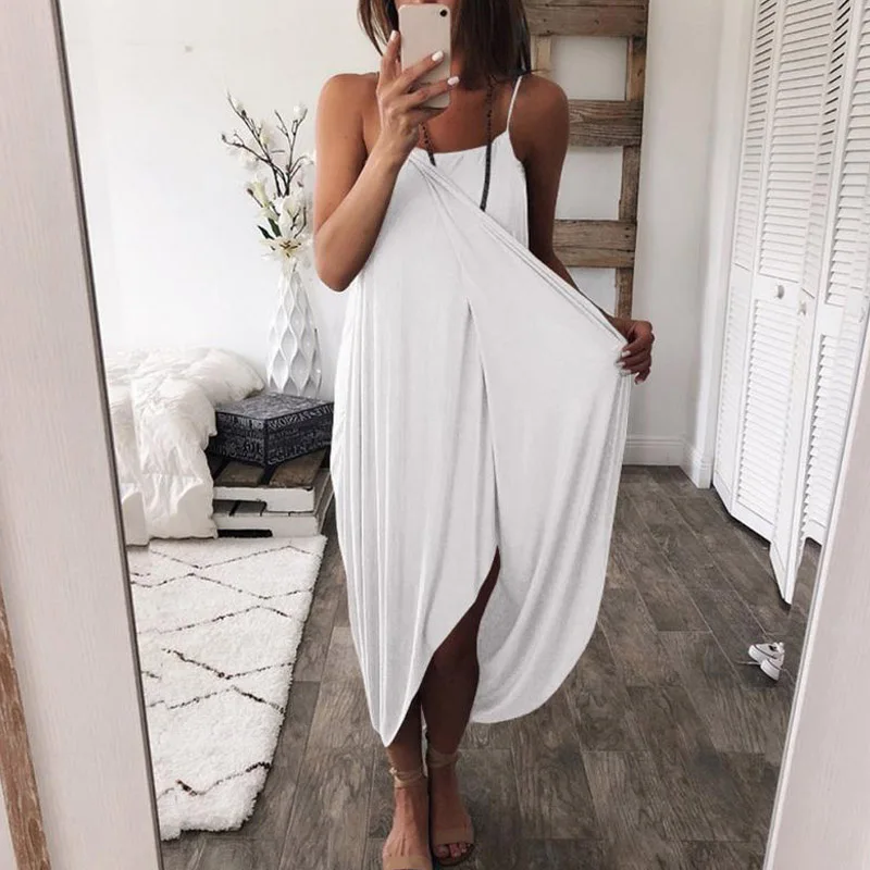 Summer new women's loose dress sexy solid color knitted irregular dress casual strap dress
Summer new women's loose dress sexy solid color knitted irregular dress casual strap dress