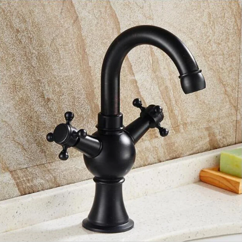 Antique Basin Faucet brass bathroom wash faucets dual handle Hot and Cold Water Tap Deck Mounted Black Oil Sink Mixer Tap
Antique Basin Faucet brass bathroom wash faucets dual handle Hot and Cold Water Tap Deck Mounted Black Oil Sink Mixer Tap