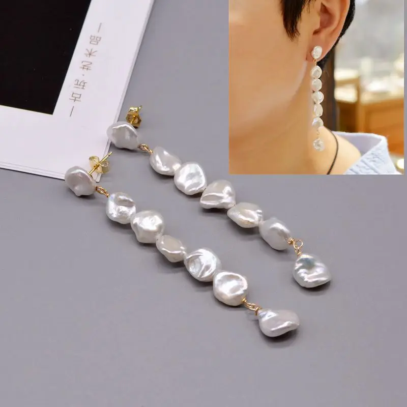 Baroque earrings, ladies gold earrings, handmade white baroque pearl jewelry, exaggerated long pearl earrings, free shipping 
Baroque earrings, ladies gold earrings, handmade white baroque pearl jewelry, exaggerated long pearl earrings, free shipping