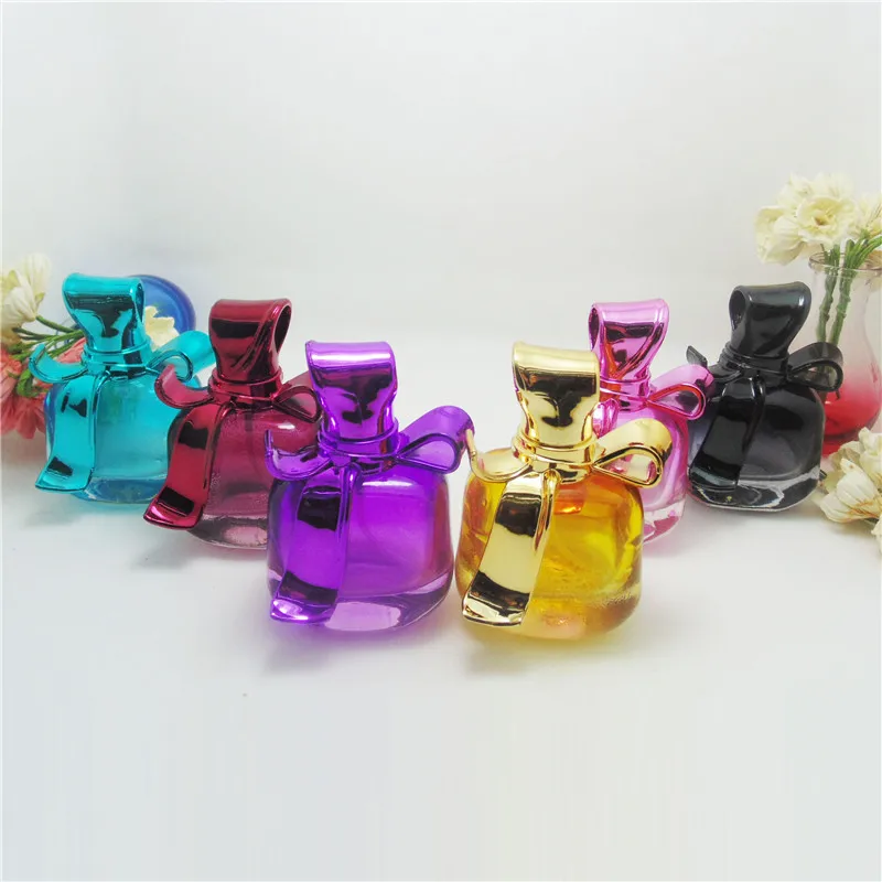 

DHL FREE 100PCS 15ml 3D Creative Bow Refillable Portable Mini Perfume Bottle &Traveler Glass Spray Atomizer Empty Parfum Bottle