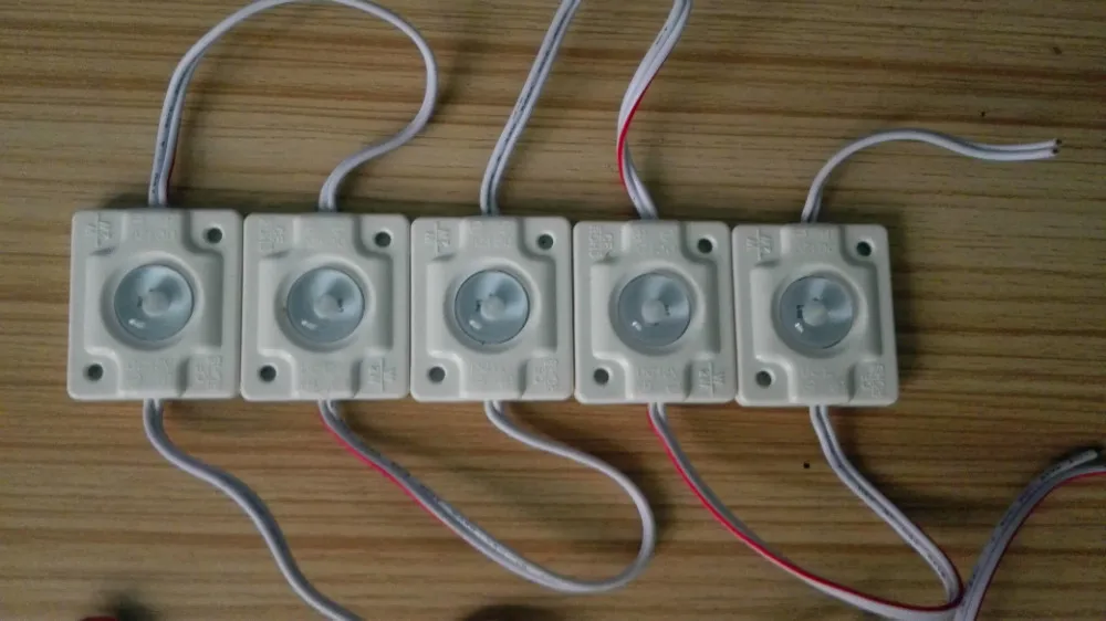 COB 3W DC12V WHITE COLOR LED module;high bright;20pcs a string;with concave lens
COB 3W DC12V WHITE COLOR LED module;high bright;20pcs a string;with concave lens