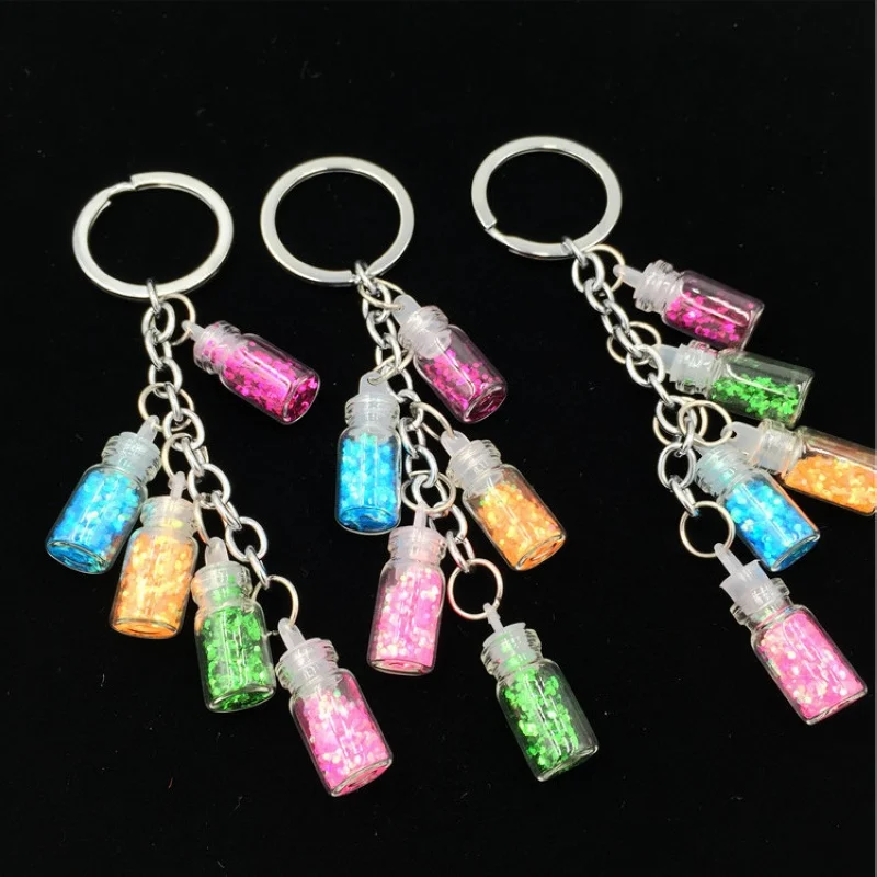 Colorized Shining Star Drift Bottle Keychain 5 Glass Bottle Keyrings For Lover Gifts Key Chain For Car Bags Key Rings
Colorized Shining Star Drift Bottle Keychain 5 Glass Bottle Keyrings For Lover Gifts Key Chain For Car Bags Key Rings