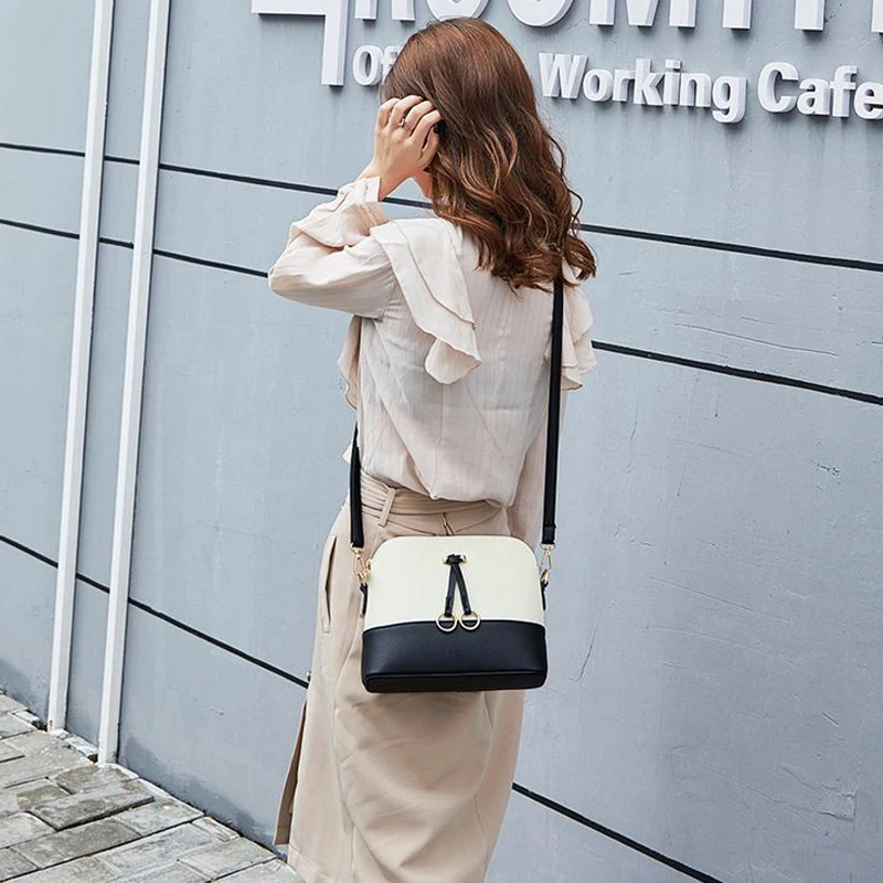 2018 autumn new Korean version of the personality fashion wild shell type female bag shoulder bag FY96
2018 autumn new Korean version of the personality fashion wild shell type female bag shoulder bag FY96